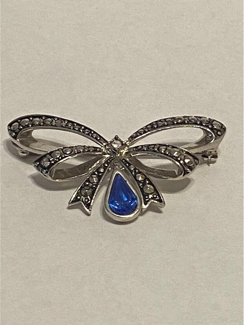 Silver-Tone Butterfly Bow Brooch Pin with Blue Teardrop Accent